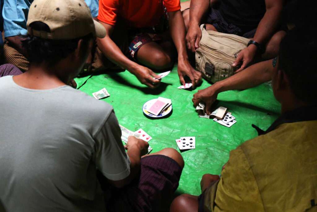 casino rankings a group of people playing cards